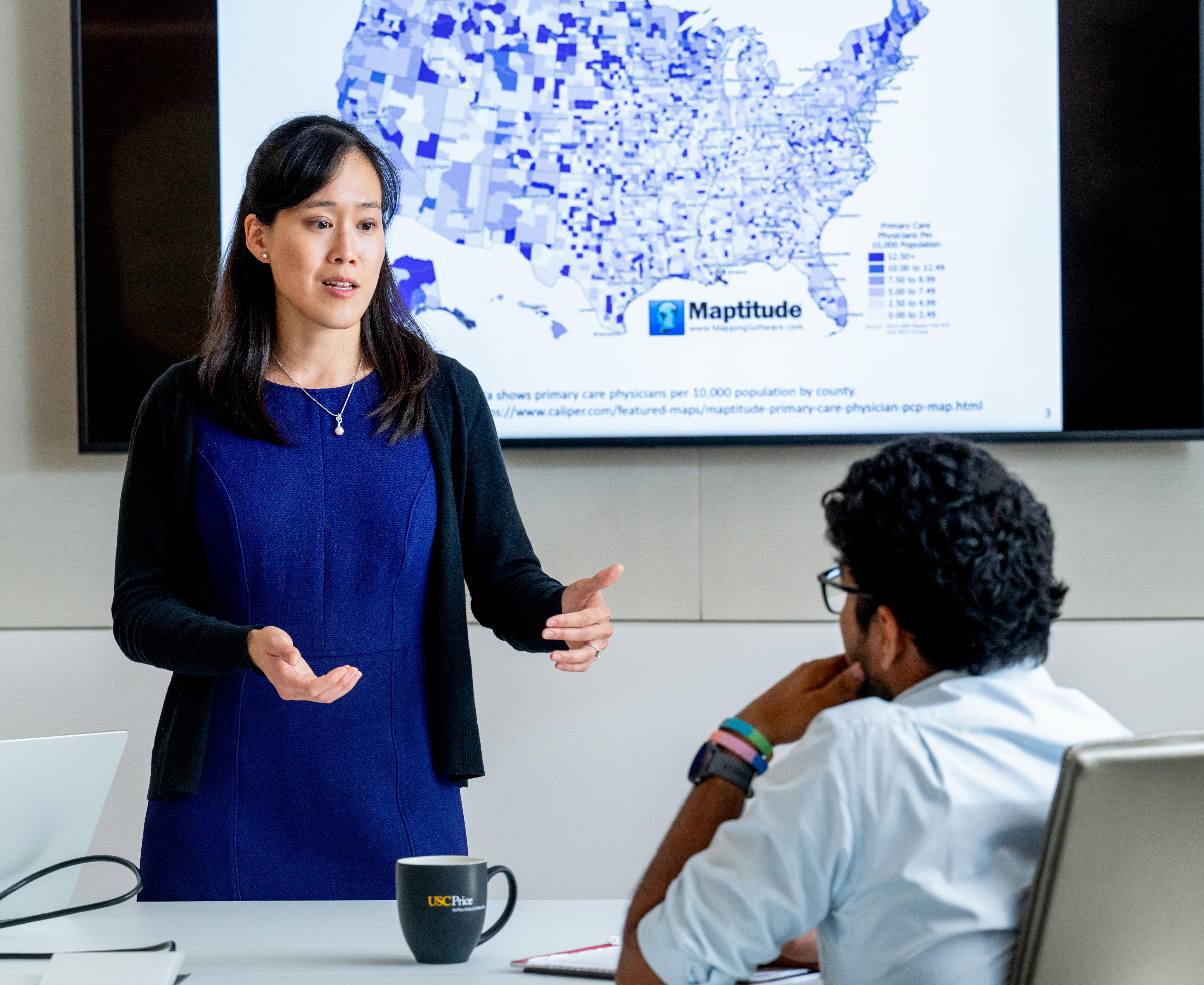 Alice Chen, Associate Professor and Vice Dean for Research, in discussion with Price students.