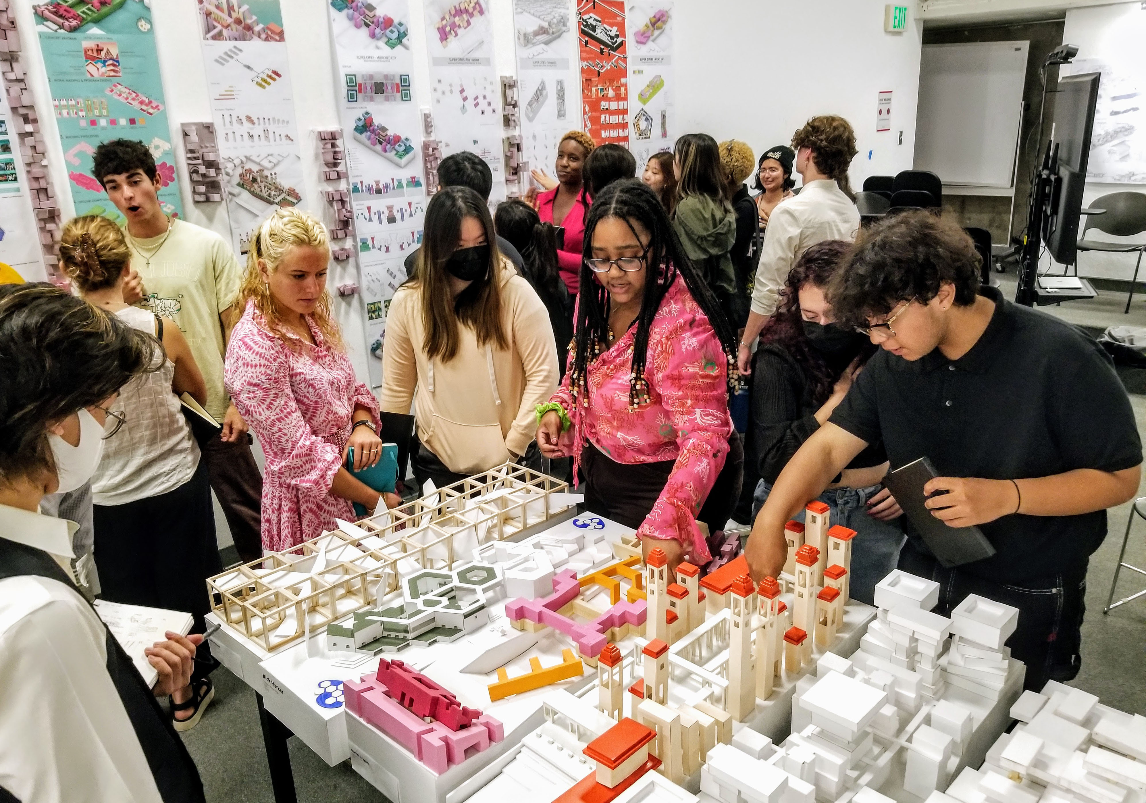 Architecture students collaborate.