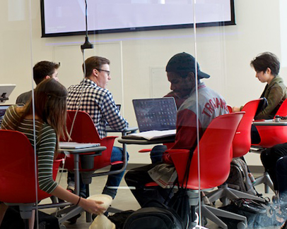Students prepare for class in the Academy Garage.