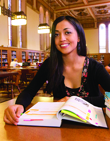 MAT student studying in the library.